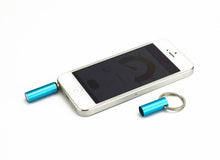 Load image into Gallery viewer, A UV-A light tester with an aluminum body connected to a smartphone, designed to measure UV output from light bulbs.