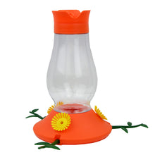 Load image into Gallery viewer, A clear, orange, flower-shaped bird feeder with vine-style perches and three feeding ports, designed to attract orioles.